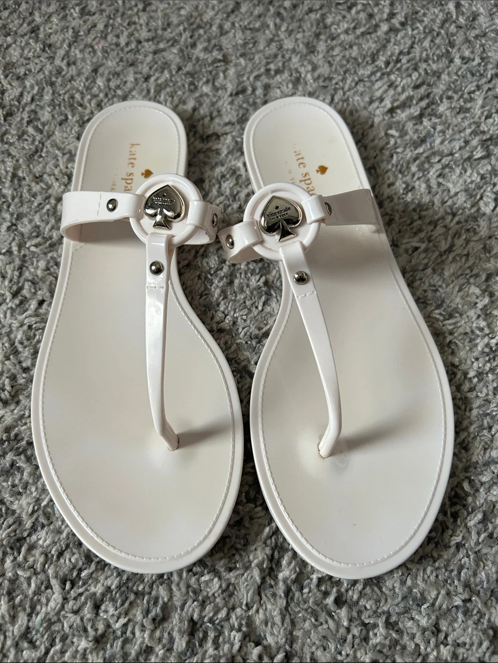 kate spade White Patent Leather T-Strap Sandals with Spade Emblem